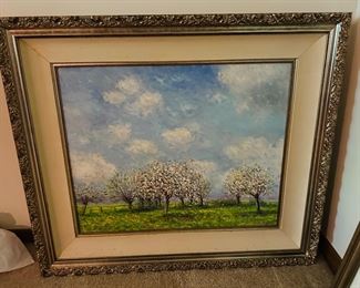 James Scoppettone "Apple Blossoms in Normandy" An original oil painting on canvas signed by the artist. Image size 24" x 30"; framed size 40.5” x 34.5” tall. Custom framed in silver ornate molding with silk scoop. 