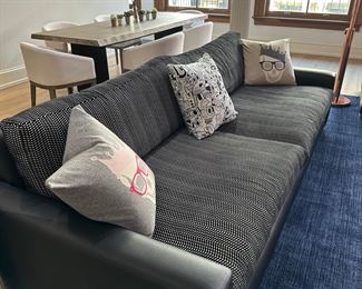 Two Custom High End Sofas. Very good condition like new. Sofa 1 XL - W 96" D 46" 
Sofa 2 Large- W 108" D 46" 
Supreme comfort Clean lines and a streamlined silhouette define its architectural attitude, while a modernist, low-slung profile and broad track arms invite lounging. Custom  Reupholstery  for both Sofas. Base fabric Kravet - (Leather) Smart Rigel-8. Cushions Fabric Romo -Bret Damatian, Actual Sofa fill with Down feather, and Luxe Depth. 
