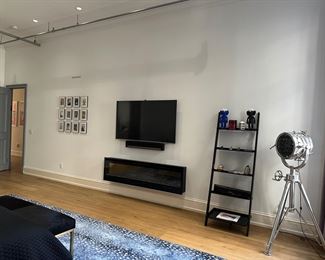 Dimplex Electric fire place selling 60 off. TV and Linear Sonos bar. Lamp, Bookcase.