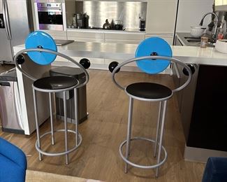 Memphis, michele de Lucchi bar stools  RARE! only 30 in world produced. These stools are super rare and are a collectible item. This pair of stools is a prototype. They have been manufactured as chairs but to the best of our knowledge they were never produced as stools. An item for a collector of the ""Memphis Milano"" movement. Rare and unusual.	Italy
Period:	1980-1999
Materials:	Metal Wood
Condition:	Great.
Creation Date:	1992
Styles / Movements:	Modern, Minimalist
H 44""  Dia 18"" Seat H 27 in "