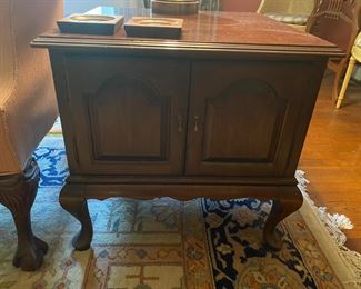 End table with cabinet storage