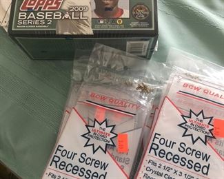Topps sealed new box of Baseball packs.
Four screw card protectors