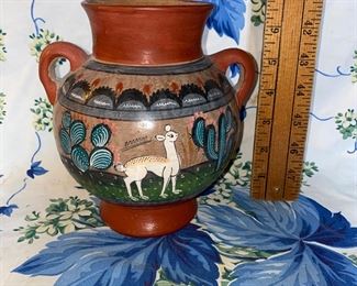 Hand Painted Pottery Vase with Deer  $8.00 Seven inches tall 