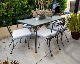 Antique iron table and 6 chairs $60 - Saturday 