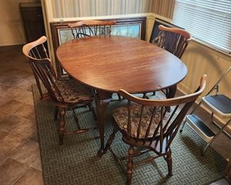 55"L 43"W 29.5"T with 2 additional leafs of 10" each