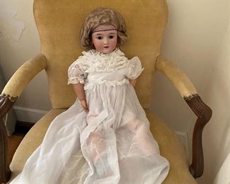 Early bisque doll with sleepy eyes