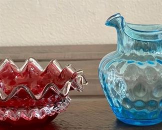 Art Glass Cranberry And Clear Ruffled Bowl And A Fenton Blue Coin Dot Handled Pitcher