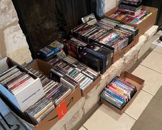 Large collection of Cd's, DVD's, some Vhs's, Collectables including some Disney, Star Wars and some great things to pick from