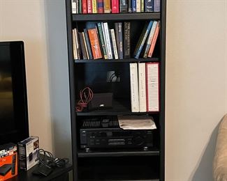 Large bookcase, it lights up, we have 2