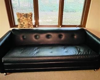 A contemporary style day bed couch. 