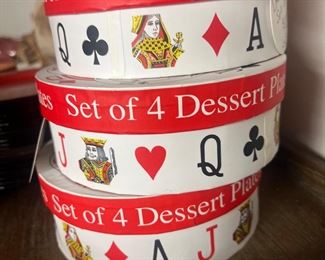 New in the box dessert plates playing card theme.