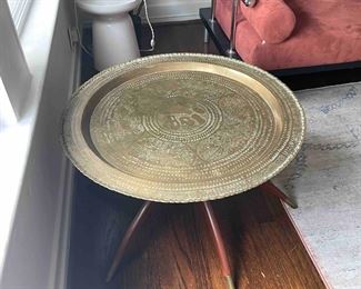 Antique brass table with spider legs. Similar table at chairish.com sells for $925. 