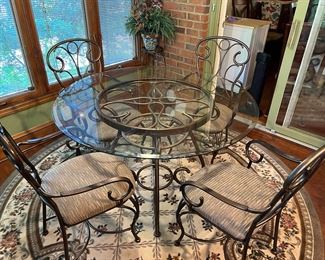 Round glass table and 4 chairs 
