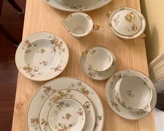 Haviland “Autumn Leaf” serving pieces and one of the eight place settings