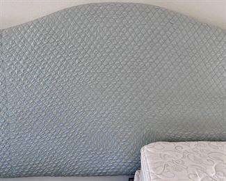 Upholstered headboard in sea foam green fabric