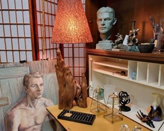 Lower left unframed on Masonite painting of a Young Stribling. Lamp with carved female figure made from a Cypress Knee.