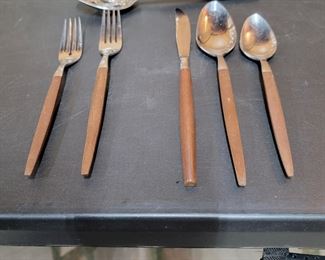 Partial set of Oneida stainless and walnut flatware. 45 pc approx.