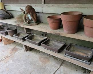 Terracotta figure of a Mermaid lower shelf bonsai trays.