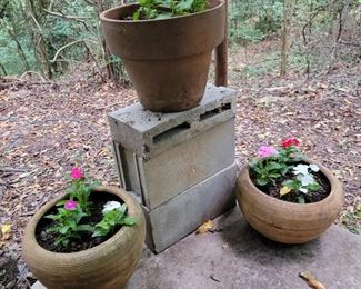 Wide selection of vintage terracotta pots.