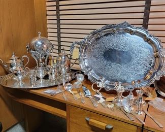 Sterling Silver Coffee/Tea Service, two large silver-plate tea trays, a Hot water stand of Sheffield Silver circa 1870 by James Dixon & Sons London.