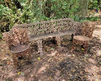 Cast Iron Bench and Two Chairs. 19th Century possibly Taylor Iron Works. Cyma Curve bench Approx 7' Long, (two of the legs need to be reattached.)