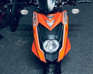 Brenda new motor scooter