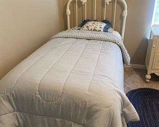 Twin bed with metal headboard 