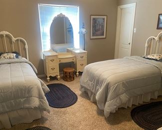 Pair of cast iron twin beds 