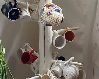Assorted Coffee Mugs on Primitive Stand