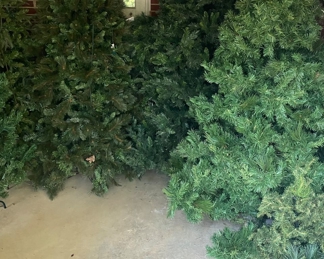 Several Artificial Christmas Trees