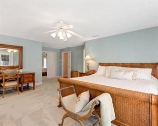 King size bed, headboard, foot board, mattress & box, bench, Tommy Bahama desk, chair and large mirror. 