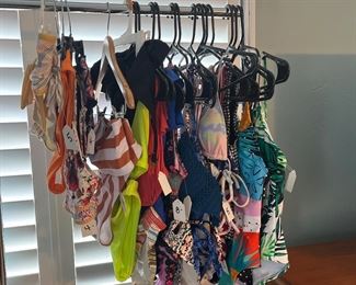 Women’s one and two piece, bathing suits, size is small and medium