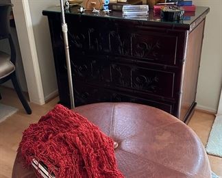 Leather ottoman, Chest of drawers, "meter" lamp, and vintage microphone/stand, dragon area rug