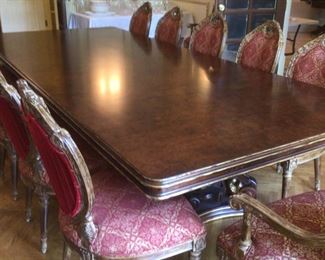Regency style burl top double pedestal banquet table with 12 chairs
