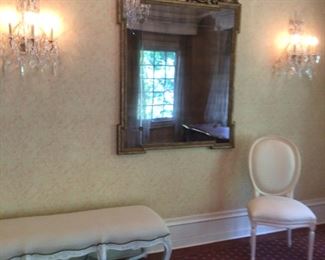 Pair of crystal sconces, gilt mirror, French style bench