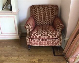 One of a pair of Edwards’s Ferrell armchairs, silk drapes