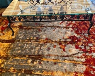 Gorgeous area rug and glass table