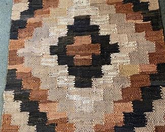 Woven leather rug