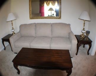 Ashley queen sleeper sofa, never slept on; heavy coffee table and matching lamp tables