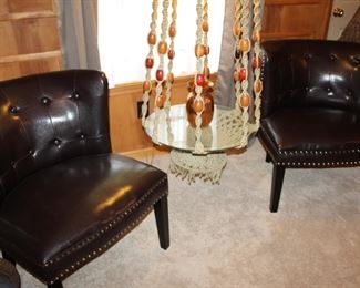 vinyl chairs with nailhead trim, two of four