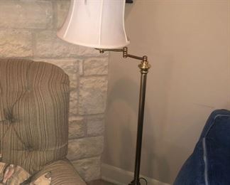 Brass swing-arm reading lamp