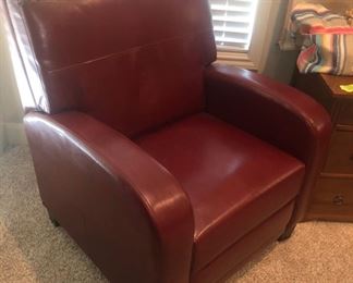 A pair of pleather recliners.
