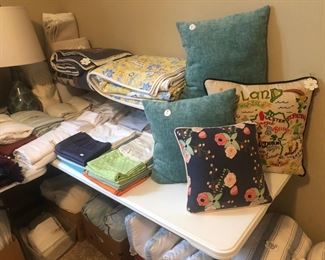 Some fine quality linens, pillows and bedding in here!