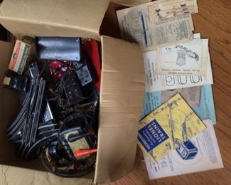 Lionel train items go with nice set displayed upstairs above the books