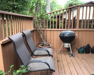 Grill, watering cans, chairs