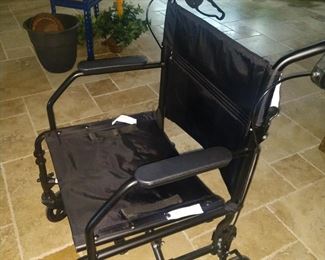 wheel chair very light & folds down