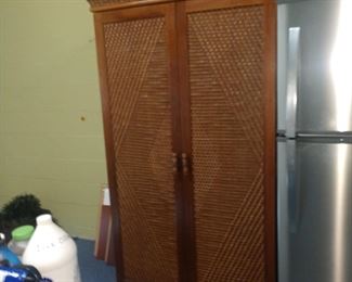 This is a cabinet , desk , file cabinet all in one