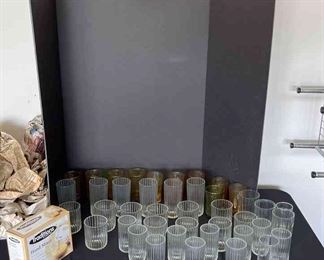 Assortment of Glasses and Hand Mixer