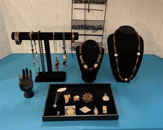 Necklaces, bracelets and broaches