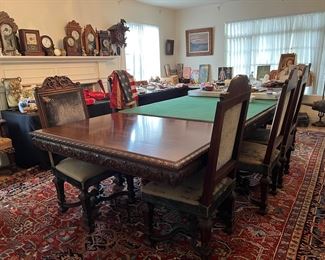 Large Antique Victorian Dining Table with two leaves and 8 chairs.